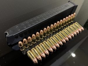 Комплект из 33 патронов 9х19 Luger в тактический магазин Glock